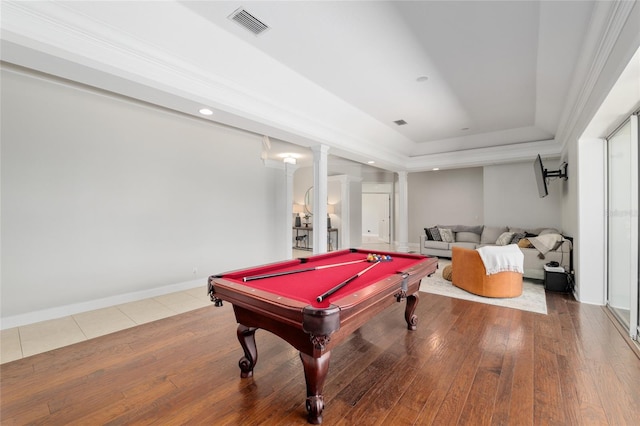 rec room with hardwood / wood-style floors, pool table, a tray ceiling, and baseboards