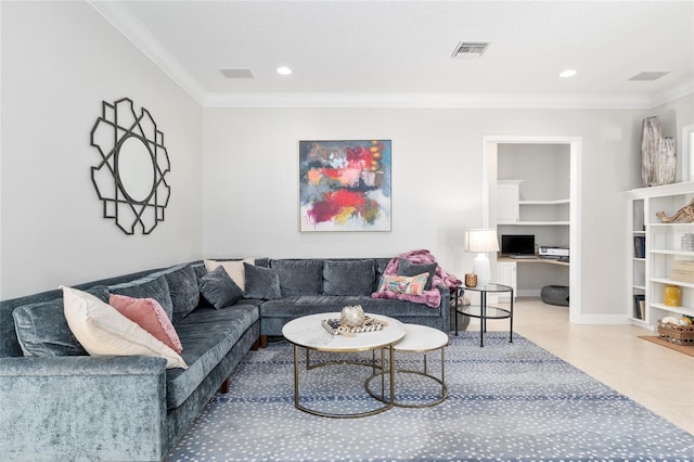 living room with ornamental molding and recessed lighting