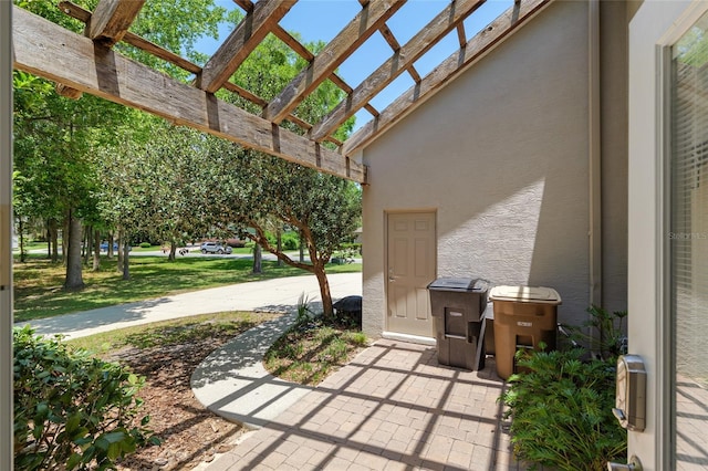 view of patio featuring a pergola