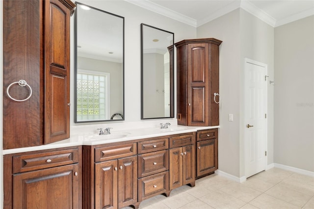 full bathroom with tile patterned floors, double vanity, baseboards, and crown molding