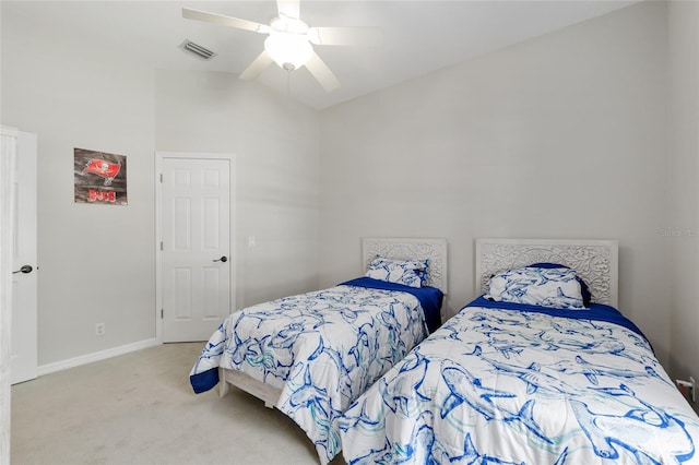bedroom featuring carpet, lofted ceiling, a ceiling fan, and baseboards