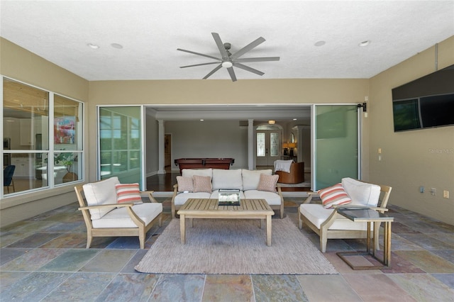 view of patio featuring outdoor lounge area and a ceiling fan
