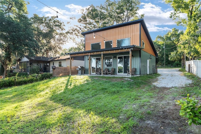 754 SE 167th Court Rd, Silver Springs, FL 34488 - rear view of property featuring a patio area