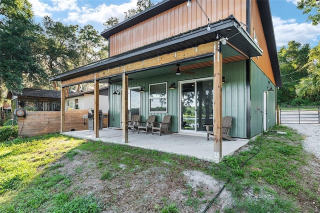 754 SE 167th Court Rd, Silver Springs, FL 34488 - back of property with a ceiling fan, a patio area, and fence