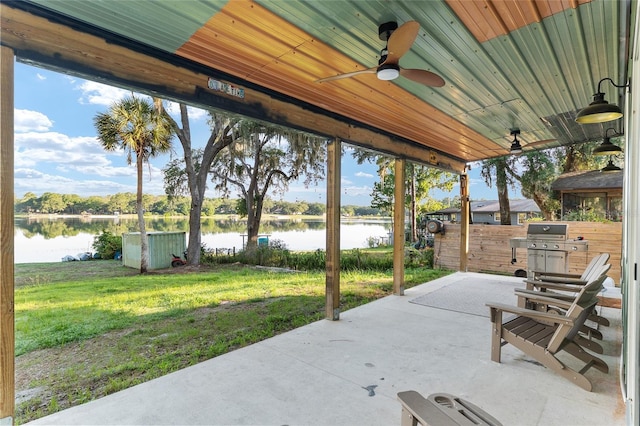 754 SE 167th Court Rd, Silver Springs, FL 34488 - view of patio featuring a water view, a ceiling fan, and a grill