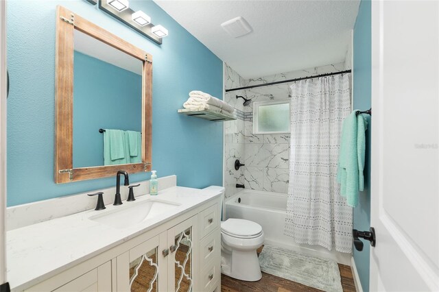 754 SE 167th Court Rd, Silver Springs, FL 34488 - bathroom with toilet, shower / tub combo with curtain, wood finished floors, and vanity