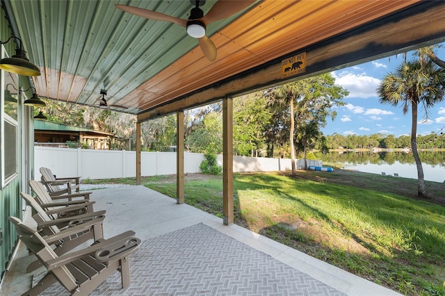 754 SE 167th Court Rd, Silver Springs, FL 34488 - view of patio / terrace with a water view and a ceiling fan