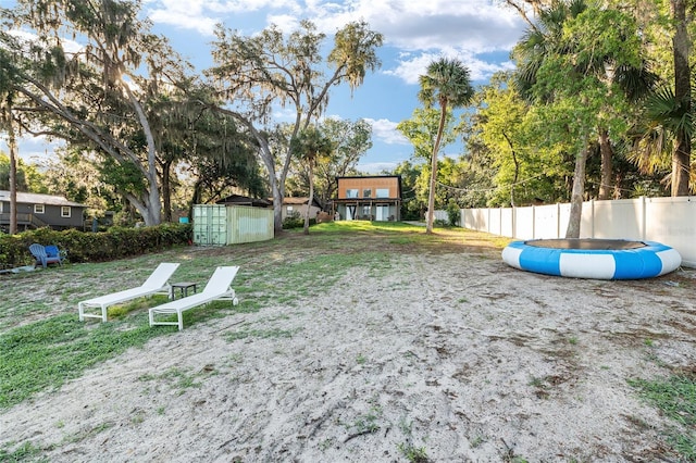754 SE 167th Court Rd, Silver Springs, FL 34488 - view of yard featuring a swimming pool and fence