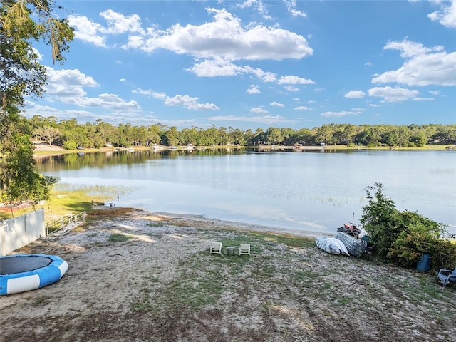 754 SE 167th Court Rd, Silver Springs, FL 34488 - water view featuring a heavily wooded area