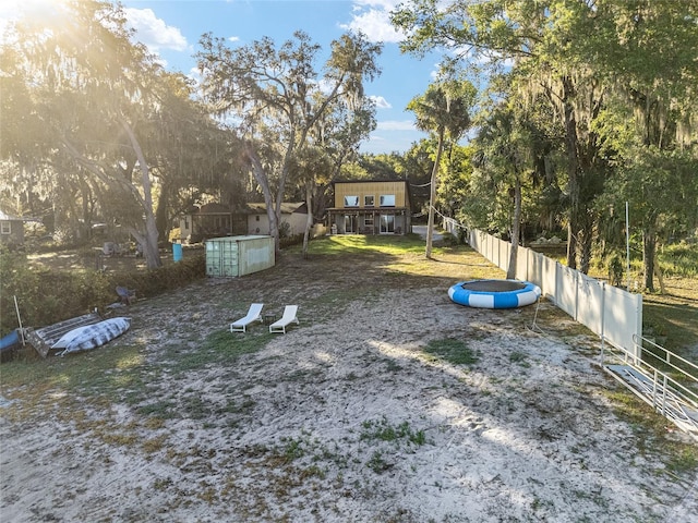 754 SE 167th Court Rd, Silver Springs, FL 34488 - view of yard featuring fence and view of scattered trees
