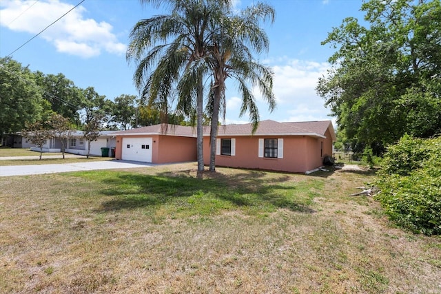 729 Sinclair Ter, Inverness, FL 34450 - view of front of home with a garage, driveway, stucco siding, and a front lawn