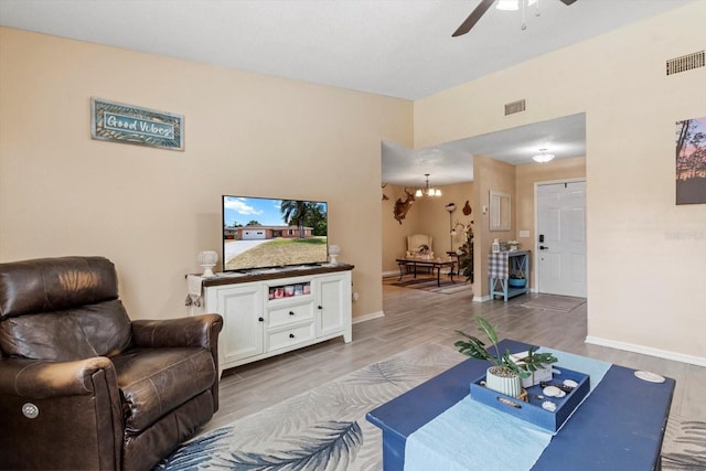 729 Sinclair Ter, Inverness, FL 34450 - living area with ceiling fan, wood finished floors, and baseboards