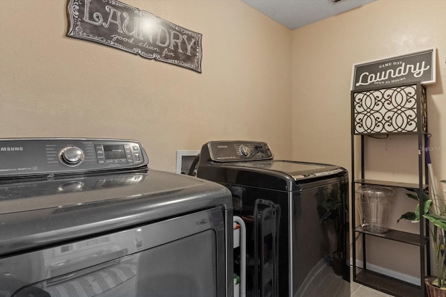 729 Sinclair Ter, Inverness, FL 34450 - washroom with washing machine and dryer and tile patterned floors