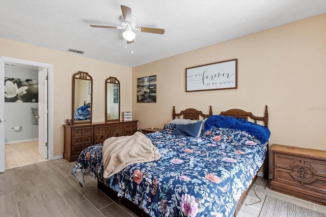 729 Sinclair Ter, Inverness, FL 34450 - bedroom with a ceiling fan and ensuite bath