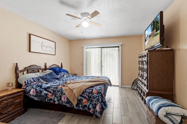 729 Sinclair Ter, Inverness, FL 34450 - bedroom featuring wood tiled floors, ceiling fan, a textured ceiling, and baseboards