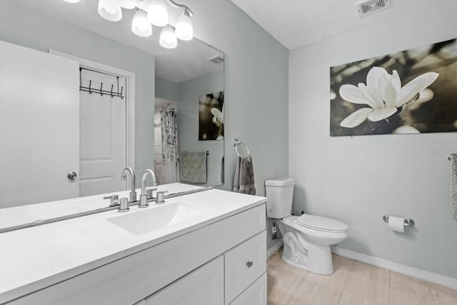 729 Sinclair Ter, Inverness, FL 34450 - bathroom with vanity, toilet, baseboards, a shower with curtain, and wood finished floors
