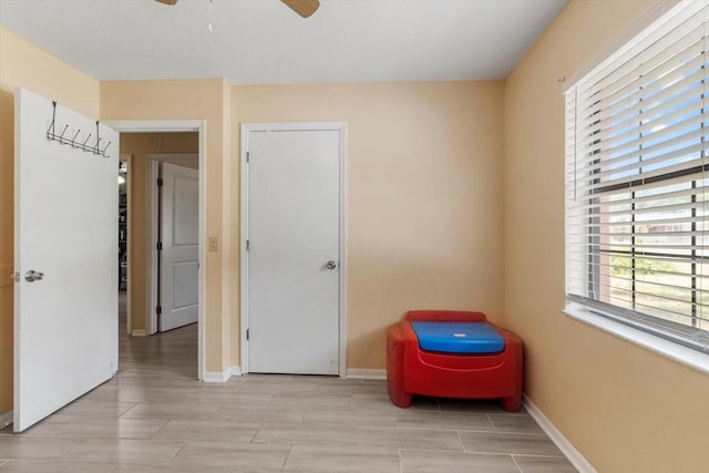 729 Sinclair Ter, Inverness, FL 34450 - bedroom with baseboards, wood finish floors, and ceiling fan
