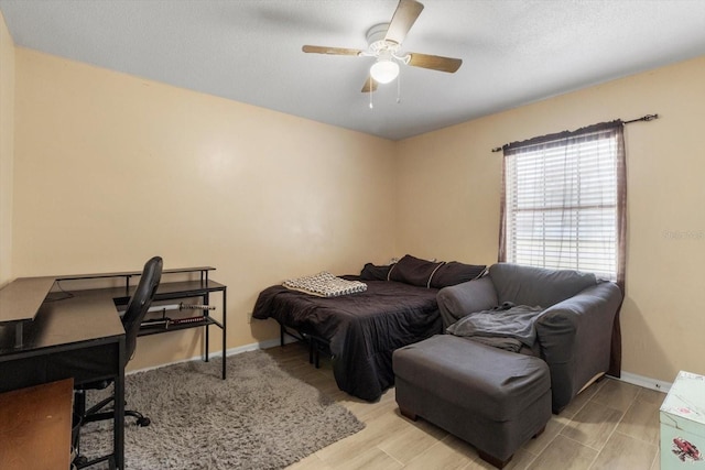 729 Sinclair Ter, Inverness, FL 34450 - bedroom with baseboards, an office area, and ceiling fan