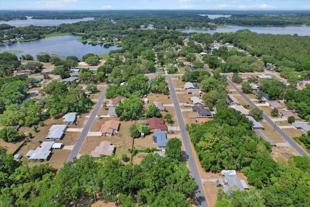 729 Sinclair Ter, Inverness, FL 34450 - view of property location featuring a large body of water and a heavily wooded area