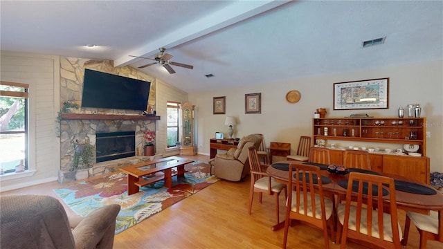 307 N Kinglet Ave, Hernando, FL 34442 - living room featuring wood finished floors, a ceiling fan, and a fireplace