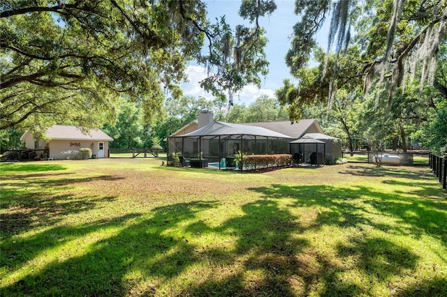 307 N Kinglet Ave, Hernando, FL 34442 - view of yard featuring glass enclosure