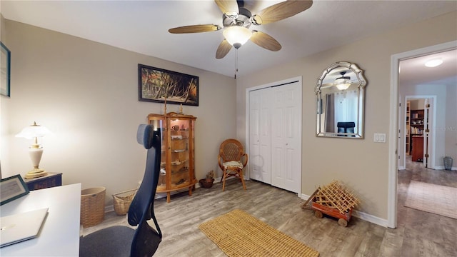 307 N Kinglet Ave, Hernando, FL 34442 - office area featuring wood finished floors, a ceiling fan, and baseboards