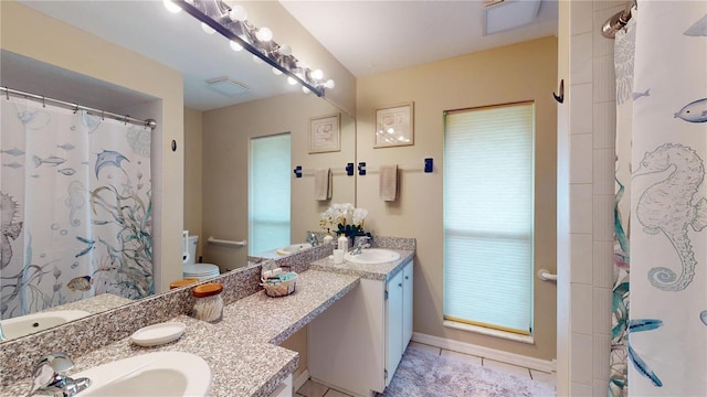 307 N Kinglet Ave, Hernando, FL 34442 - bathroom with tile patterned flooring, double vanity, toilet, and a shower with shower curtain