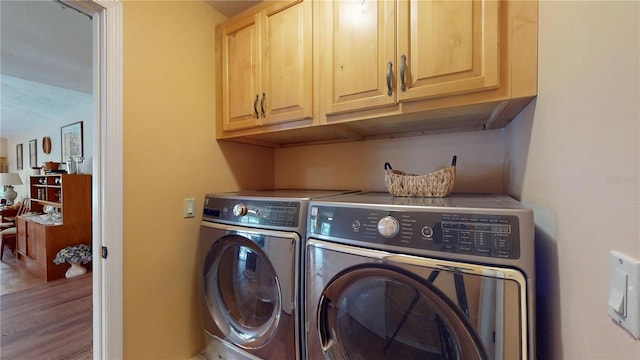 307 N Kinglet Ave, Hernando, FL 34442 - washroom featuring cabinet space, washer and dryer, and wood finished floors