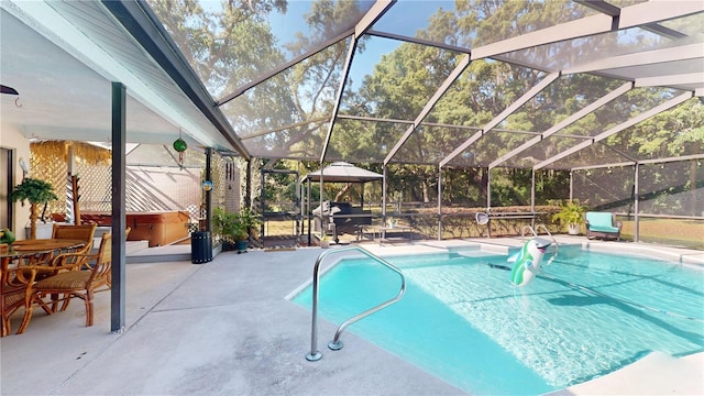 307 N Kinglet Ave, Hernando, FL 34442 - outdoor pool featuring a patio and glass enclosure