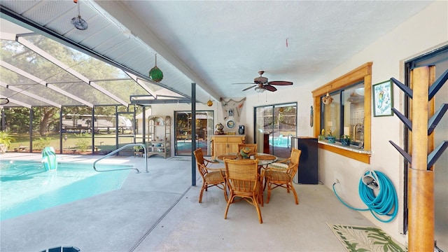 307 N Kinglet Ave, Hernando, FL 34442 - sunroom featuring a swimming pool and a ceiling fan
