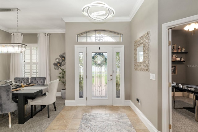 3612 SE 47th Ter, Ocala, FL 34480 - foyer entrance with a chandelier, ornamental molding, and baseboards