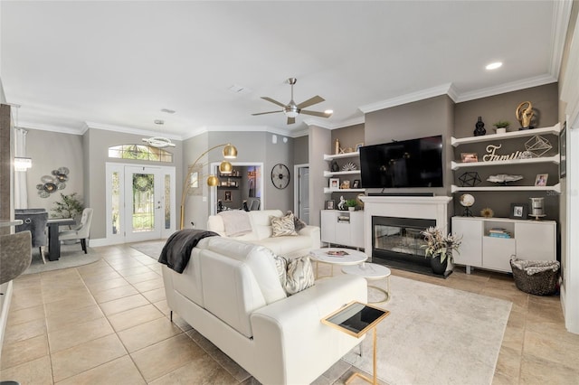 3612 SE 47th Ter, Ocala, FL 34480 - living area with ceiling fan, a fireplace with flush hearth, crown molding, light tile patterned floors, and recessed lighting