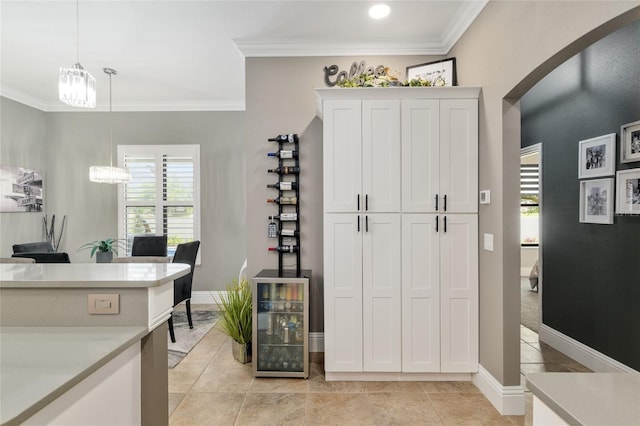 3612 SE 47th Ter, Ocala, FL 34480 - office featuring ornamental molding, beverage cooler, baseboards, light tile patterned floors, and a chandelier