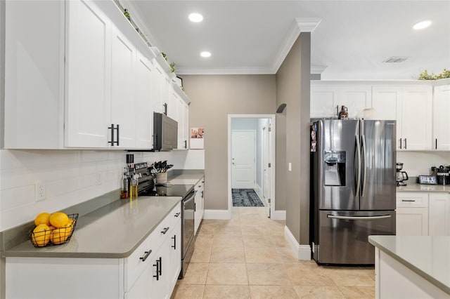 3612 SE 47th Ter, Ocala, FL 34480 - kitchen featuring stainless steel fridge with ice dispenser, electric range, white cabinetry, ornamental molding, and tasteful backsplash