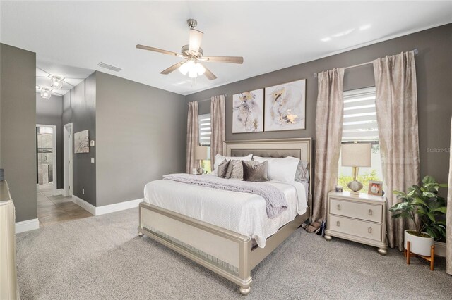 3612 SE 47th Ter, Ocala, FL 34480 - carpeted bedroom with ceiling fan and baseboards