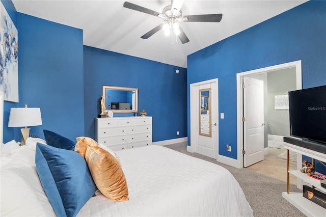 3612 SE 47th Ter, Ocala, FL 34480 - carpeted bedroom featuring baseboards, lofted ceiling, and a ceiling fan