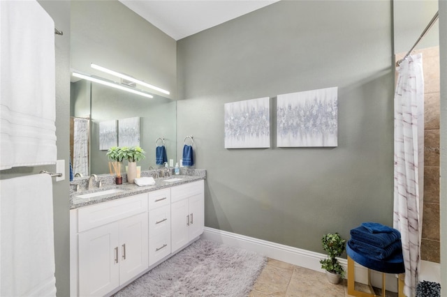 3612 SE 47th Ter, Ocala, FL 34480 - bathroom featuring double vanity, baseboards, and a shower with shower curtain