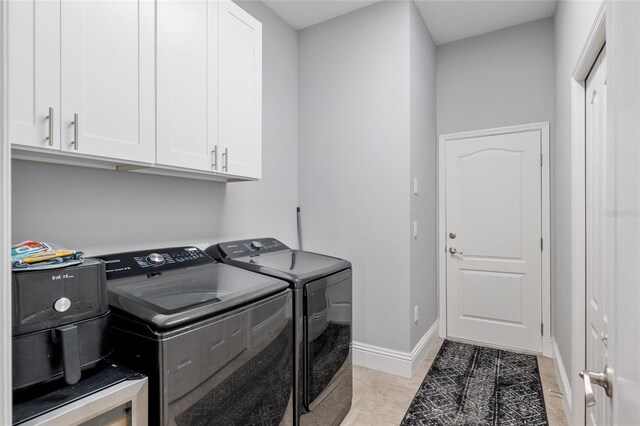 3612 SE 47th Ter, Ocala, FL 34480 - clothes washing area with separate washer and dryer, cabinet space, and baseboards