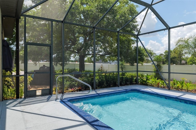 3612 SE 47th Ter, Ocala, FL 34480 - view of swimming pool featuring a fenced backyard and glass enclosure
