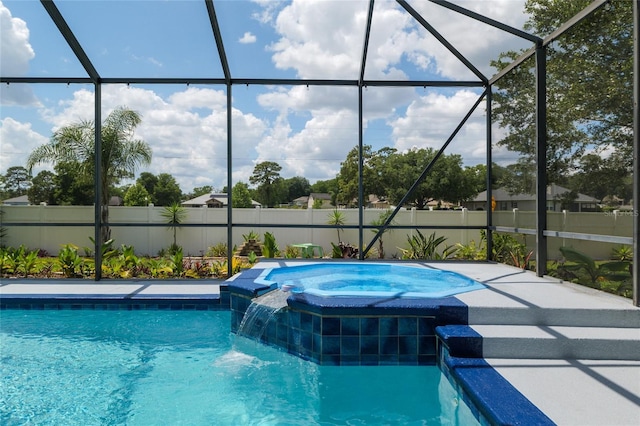 3612 SE 47th Ter, Ocala, FL 34480 - view of swimming pool with fence, a lanai, and a pool with connected hot tub