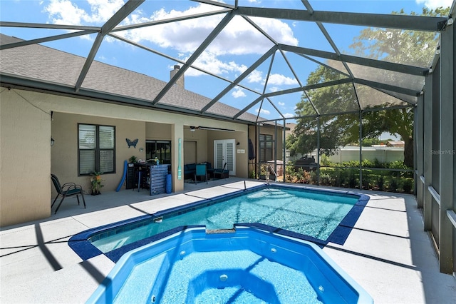 3612 SE 47th Ter, Ocala, FL 34480 - view of swimming pool with a patio, a pool with connected hot tub, a ceiling fan, and a lanai