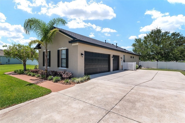 3612 SE 47th Ter, Ocala, FL 34480 - view of side of property with a garage, concrete driveway, and stucco siding