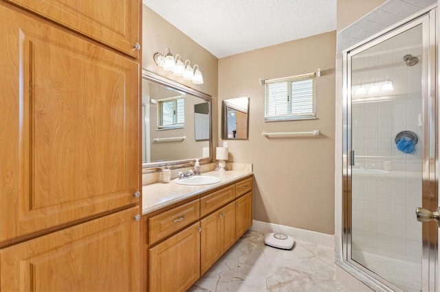 17576 SE 96th Ct, Summerfield, FL 34491 - bathroom with marble finish floors, vanity, a stall shower, healthy amount of natural light, and a textured ceiling