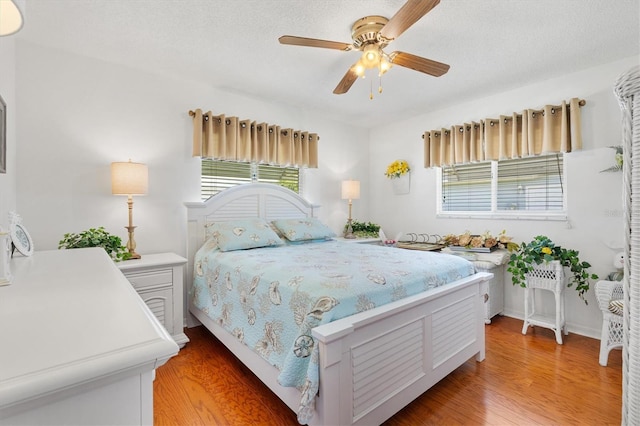 17576 SE 96th Ct, Summerfield, FL 34491 - bedroom featuring light wood-style floors and a ceiling fan