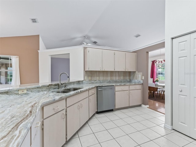17233 SE 115th Terrace Rd, Summerfield, FL 34491 - kitchen with a sink, dishwasher, lofted ceiling, a ceiling fan, and light tile patterned floors