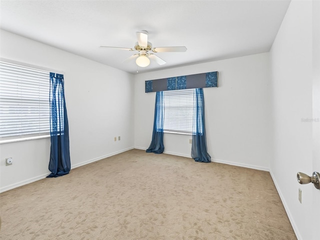 17233 SE 115th Terrace Rd, Summerfield, FL 34491 - carpeted empty room featuring plenty of natural light, ceiling fan, and baseboards