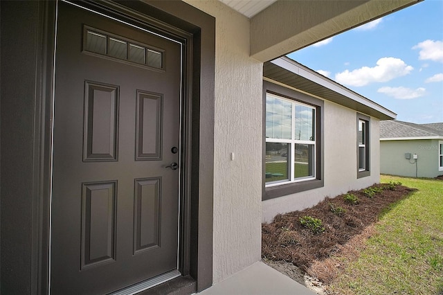 20 Emerald Trl, Ocala, FL 34472 - view of exterior entry with stucco siding