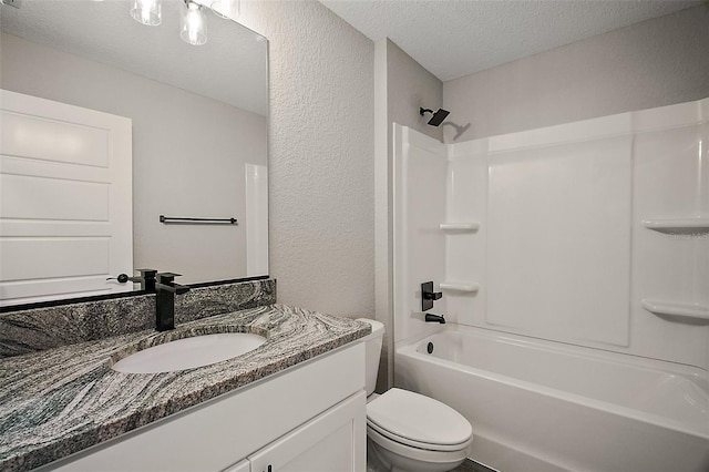 20 Emerald Trl, Ocala, FL 34472 - bathroom featuring a textured ceiling, a textured wall, toilet, vanity, and  shower combination