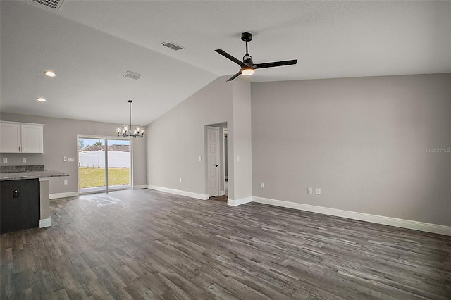 20 Emerald Trl, Ocala, FL 34472 - unfurnished living room with a chandelier, ceiling fan, lofted ceiling, baseboards, and dark wood-style flooring