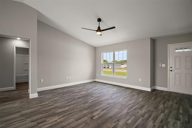 20 Emerald Trl, Ocala, FL 34472 - unfurnished living room featuring a ceiling fan, lofted ceiling, dark wood-type flooring, and baseboards